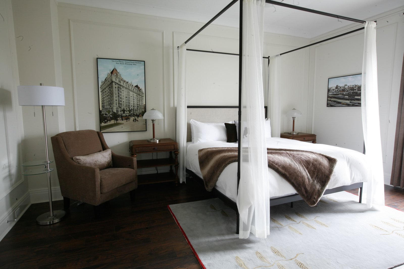 Canopy bedroom with armchair interior design — Parishi Design Studio Toronto
